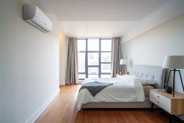 Air conditioner on the wall in a modern bedroom in Christchurch